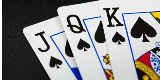 a zoom-in on the corners of the royal poker cards. 