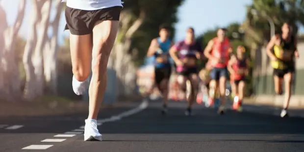 A man leading in a marathon. 