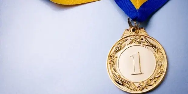 A picture of a gold medal.