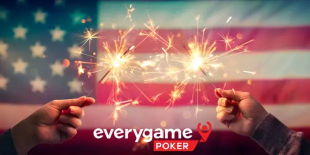 Two people lighting up sparkles with the American flag in the background