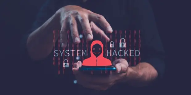 A man holding a phone with the words 'system hacked' appearing above it. 