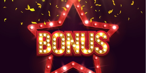the word "bonus" lit up with lights and spotlights