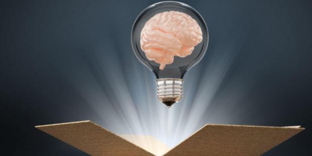 brain stuck in a lightbulb jumping out of a box
