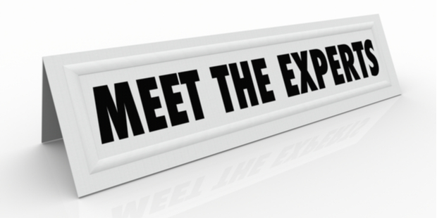 desk sign that says Meet the Experts