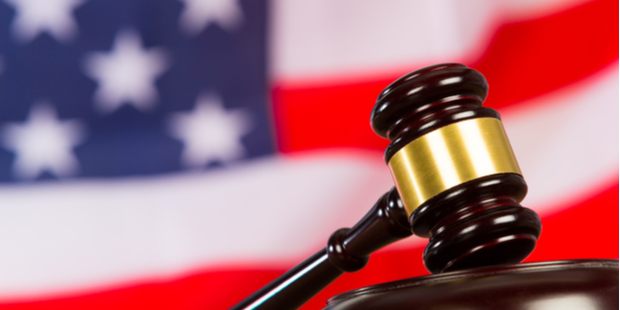A gavel on the background of the US flag