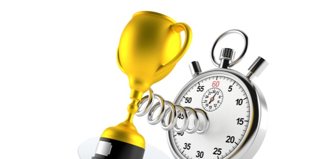 golden trophy with a stopwatch on a white background