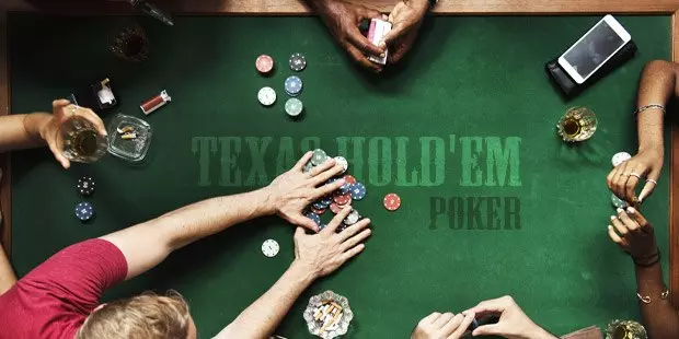 People playing Texas Hold'em Poker at a poker table  