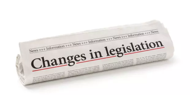 A newspaper title stating, "changes in legislation". 