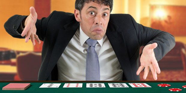 Poker player with quizzical look