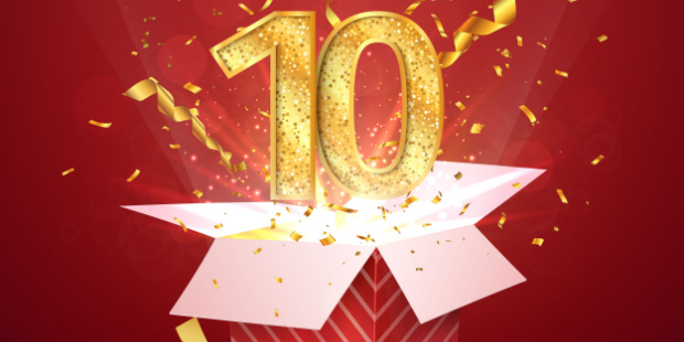 The number 10 bursting out of a gift box. 