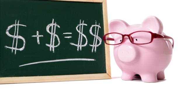 a piggy bank with glasses next to a chalk board showing $+$=$$