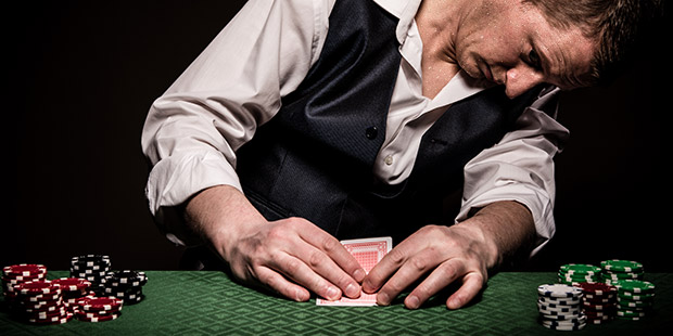 Poker Player Sweating as he Calculates Pot Odds