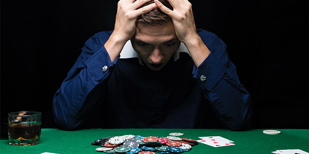 Online poker player concentrating deeply