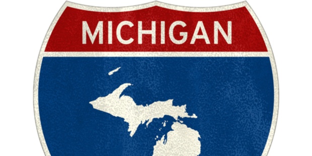 road sign indicating Michigan